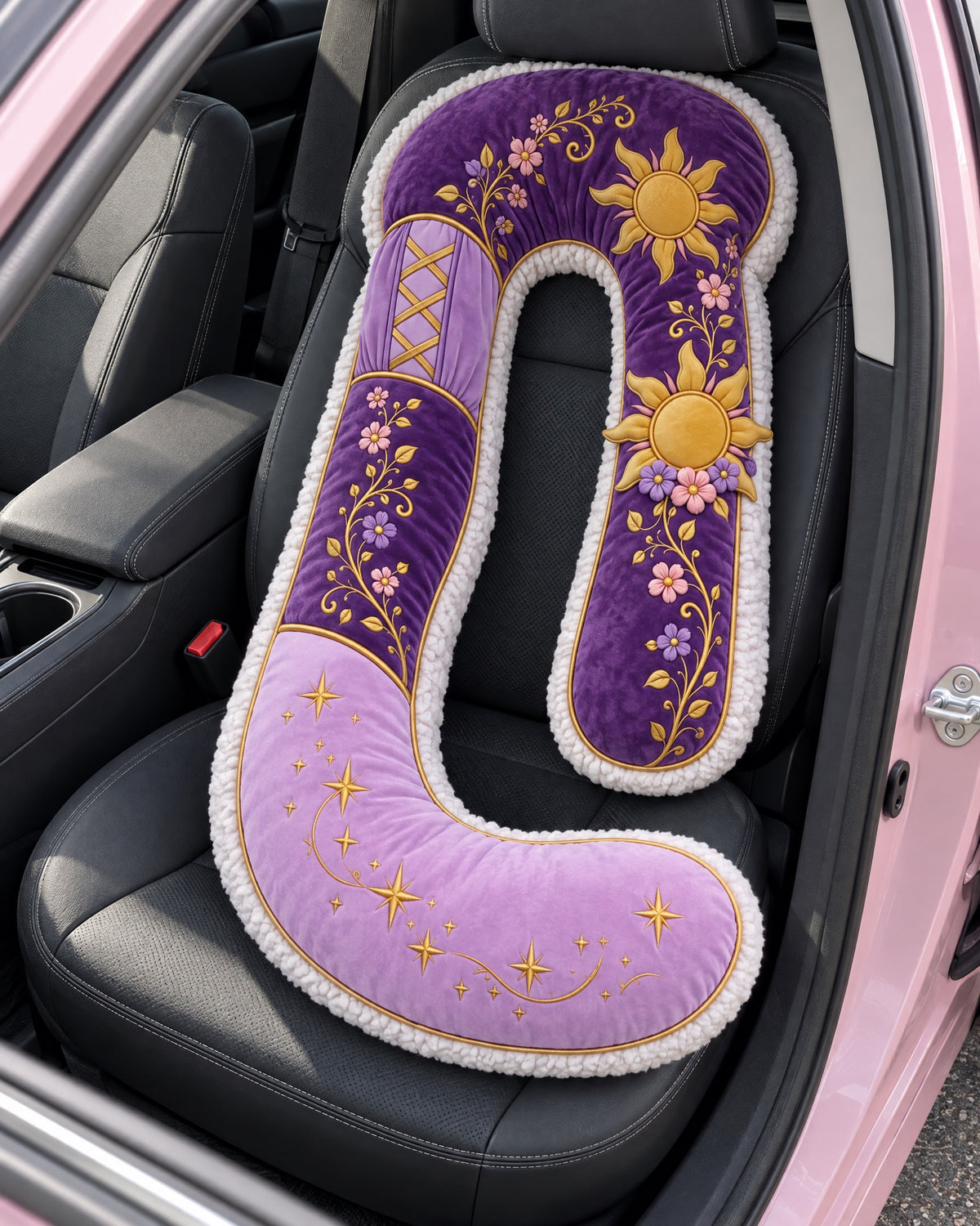 The purple Princess Pillow on a car passenger seat